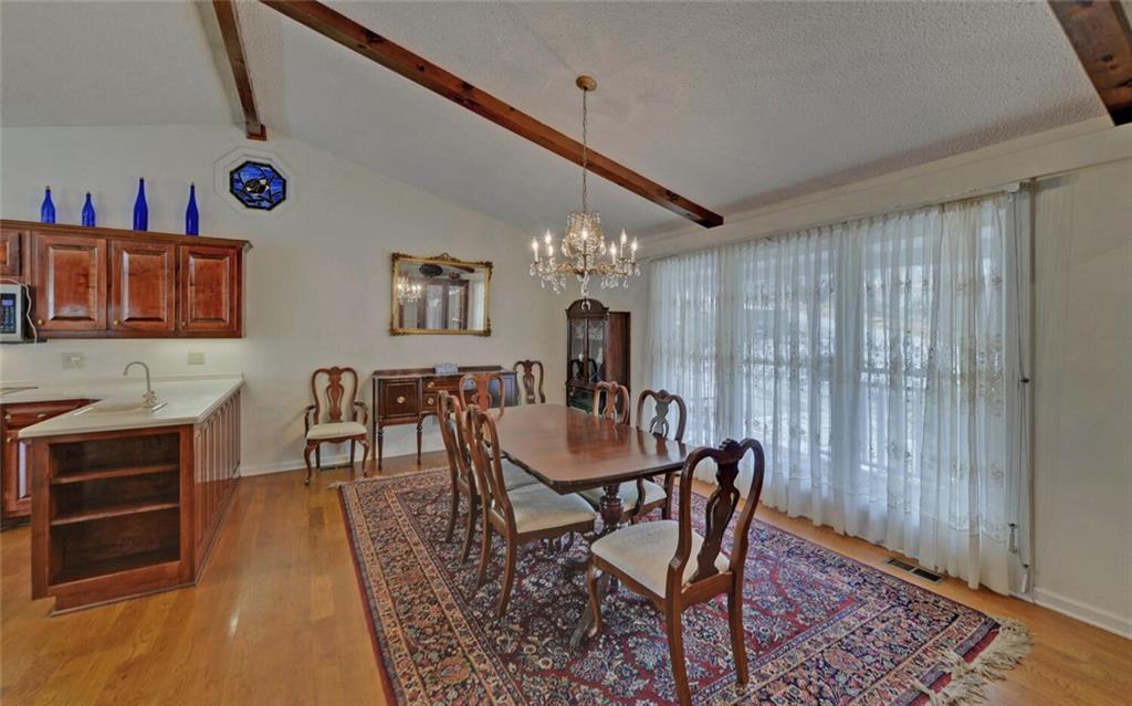 290 Waterfall Drive Cleveland, GA 30528 - Photo 8 of 46 a dining room with furniture and window