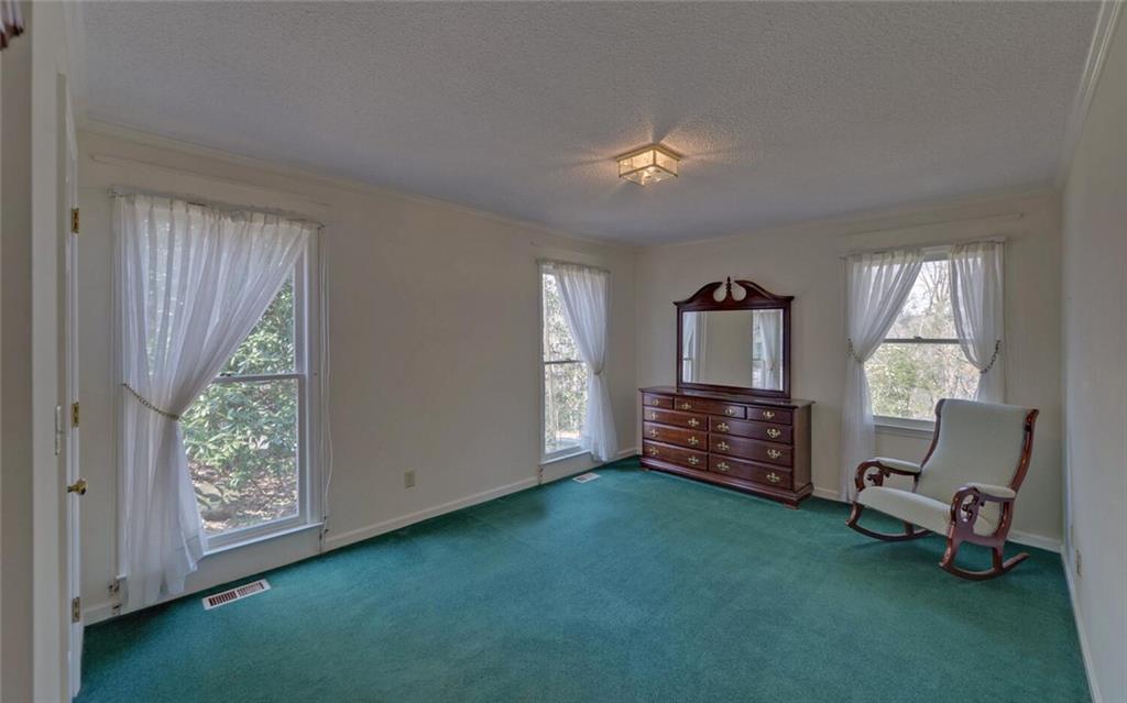 290 Waterfall Drive Cleveland, GA 30528 - Photo 10 of 46 a living room with furniture and a window
