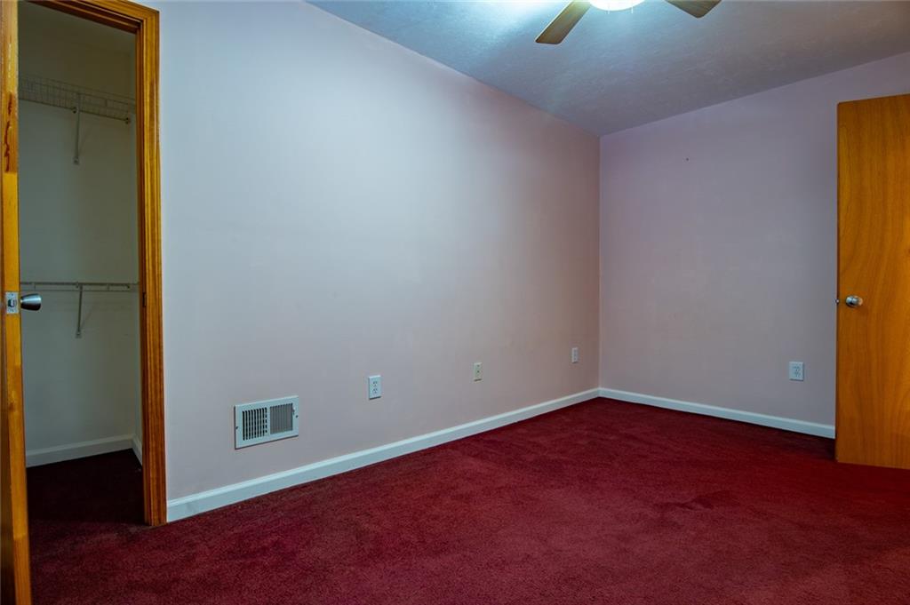 360 Parr Farm Road Covington, GA 30016 - Photo 47 of 74 an empty room with a empty space and a window