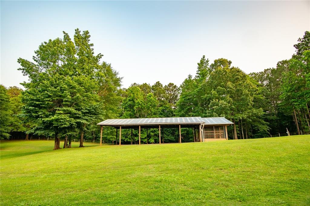 360 Parr Farm Road Covington, GA 30016 - Photo 60 of 74 a front view of house with yard and green space