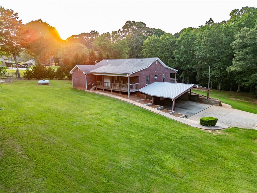 360 Parr Farm Road Covington, GA 30016 - Photo 65 of 74 a aerial view of a house with backyard garden and outdoor seating