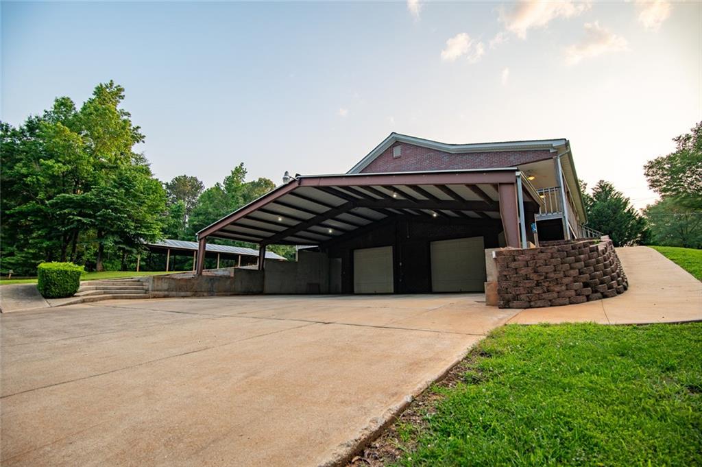 360 Parr Farm Road Covington, GA 30016 - Photo 73 of 74 a front view of a house with a garden