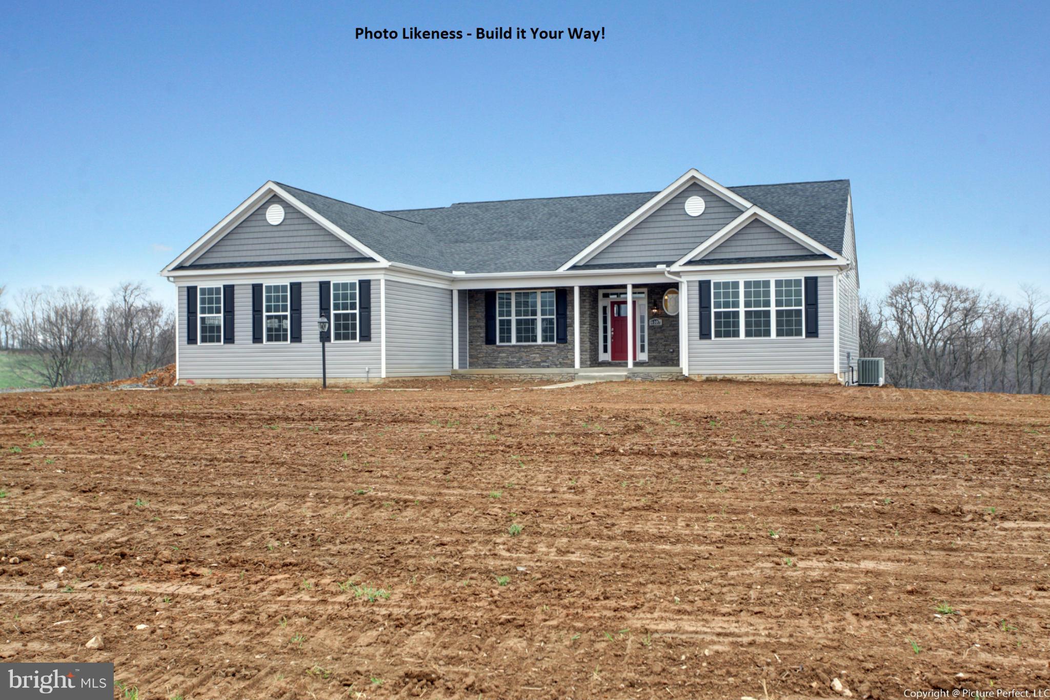 5307 Renn Road Frederick, MD 21703 - Photo 4 of 6 a front view of a house with yard and trees