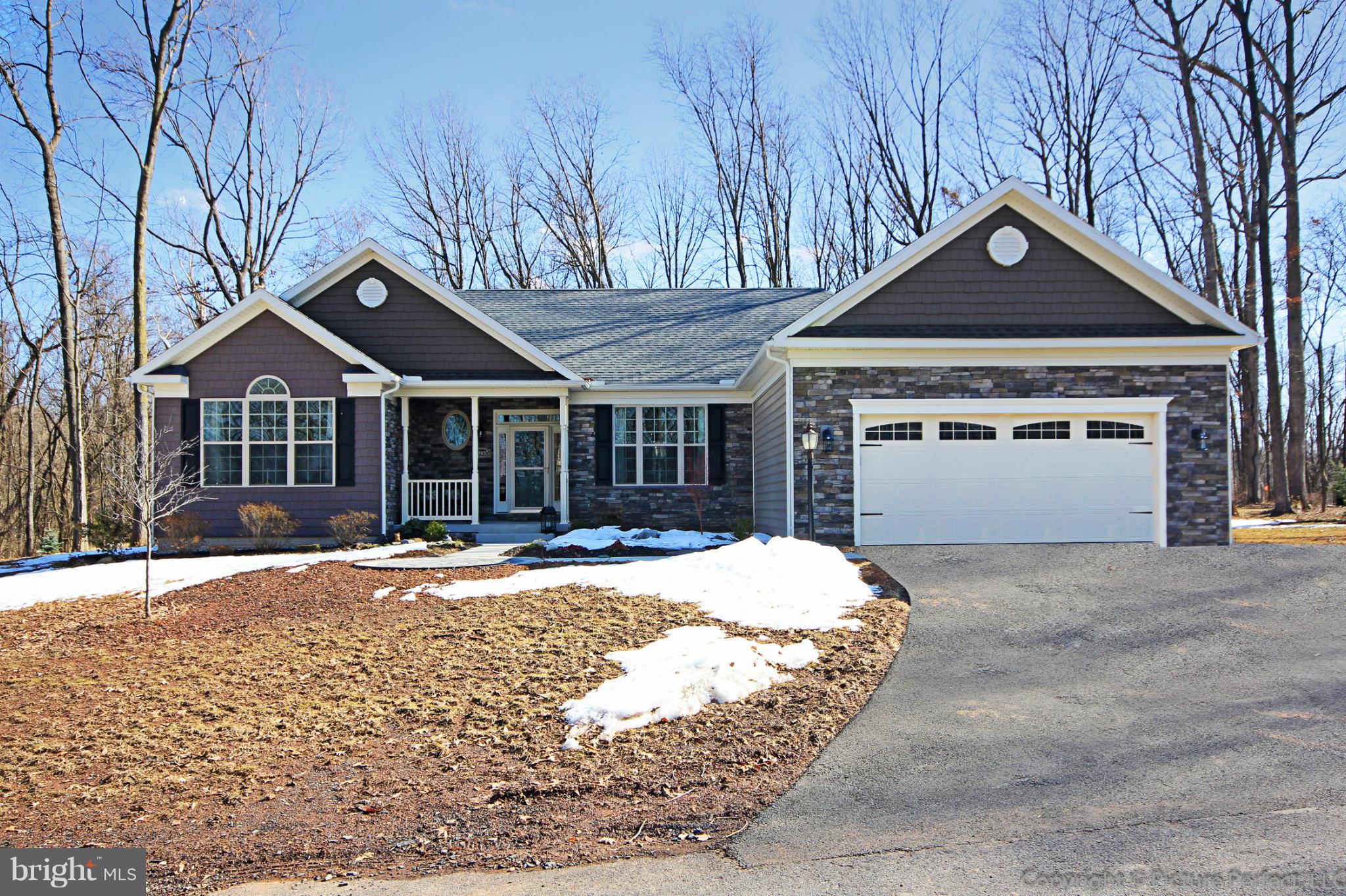 5307 Renn Road Frederick, MD 21703 - Photo 6 of 6 a front view of a house with a yard and garage