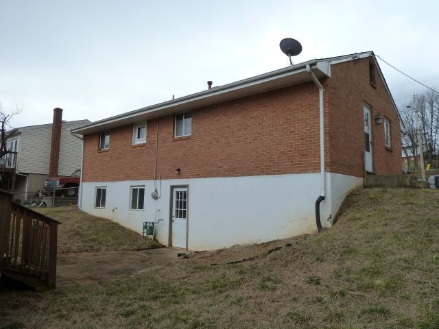 659 Ramada Road Vinton, VA 24179 - Photo 14 of 16 a front view of a house with roof