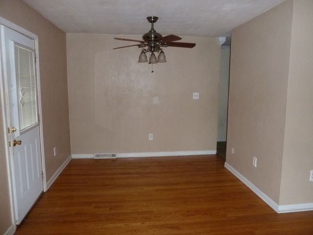 659 Ramada Road Vinton, VA 24179 - Photo 3 of 16 wooden floor in an empty room with a window