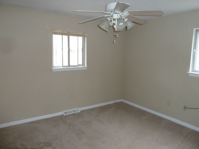 659 Ramada Road Vinton, VA 24179 - Photo 8 of 16 an empty room with a window