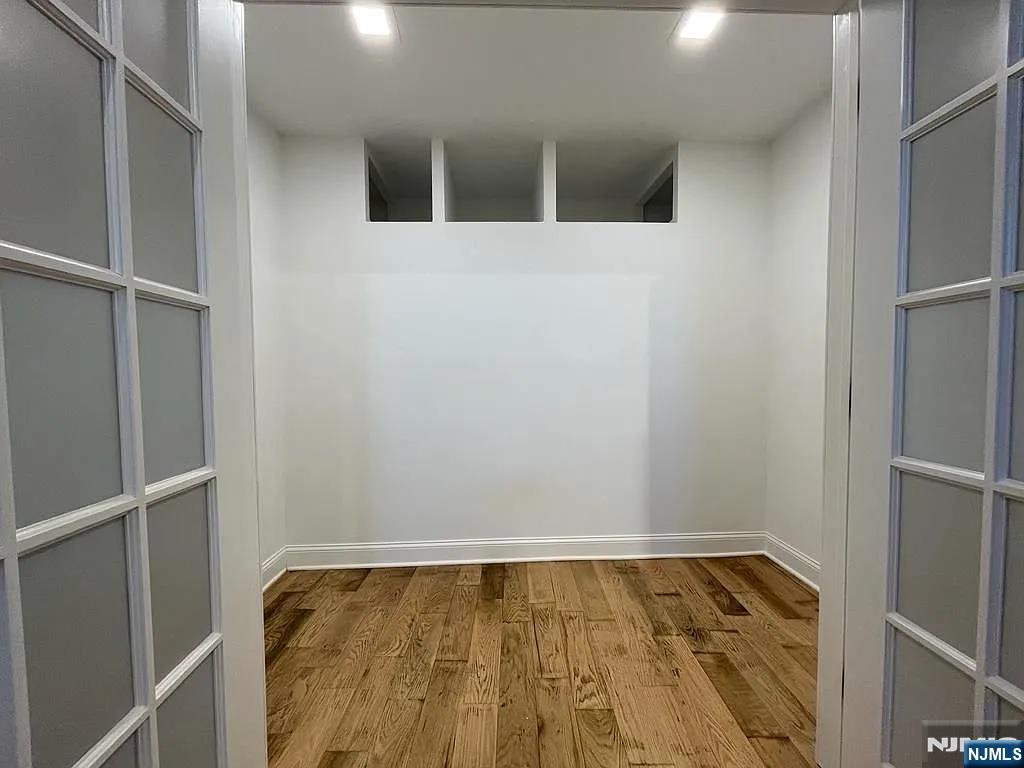 9009 Riverside Place, Unit 2 North Bergen, NJ 07047 - Photo 11 of 14 a view of walk in closet