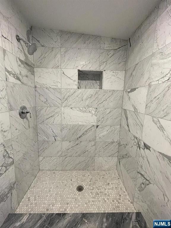 9009 Riverside Place, Unit 2 North Bergen, NJ 07047 - Photo 8 of 14 a bathroom with a shower