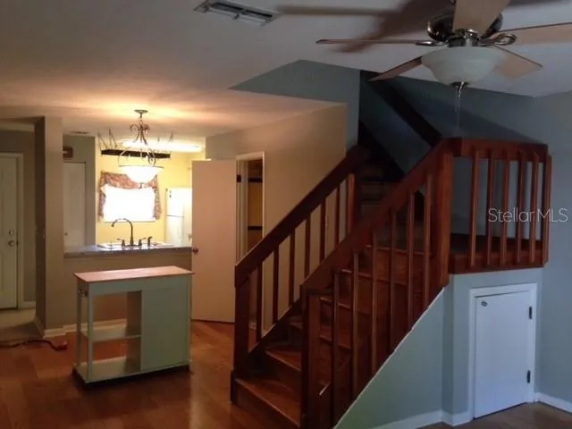 a kitchen with a stove and a microwave