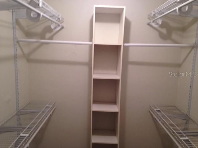 4007 Southwest 20th Lane, Unit 33B Gainesville, FL 32607 - Photo 9 of 11 a view of an empty walk in closet