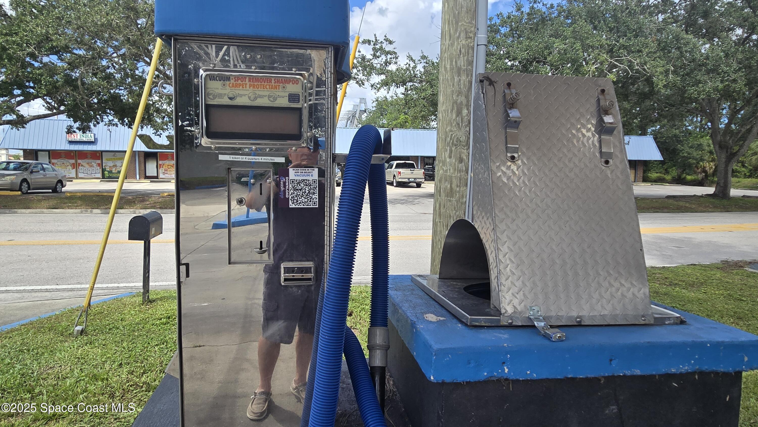 745 South Wickham Road West Melbourne, FL 32904 - Photo 22 of 67 a view of living room kitchen with furniture and a fireplace