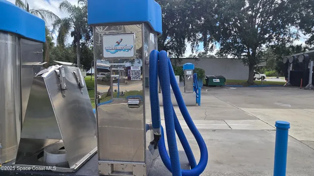 a view of swimming pool with seating area