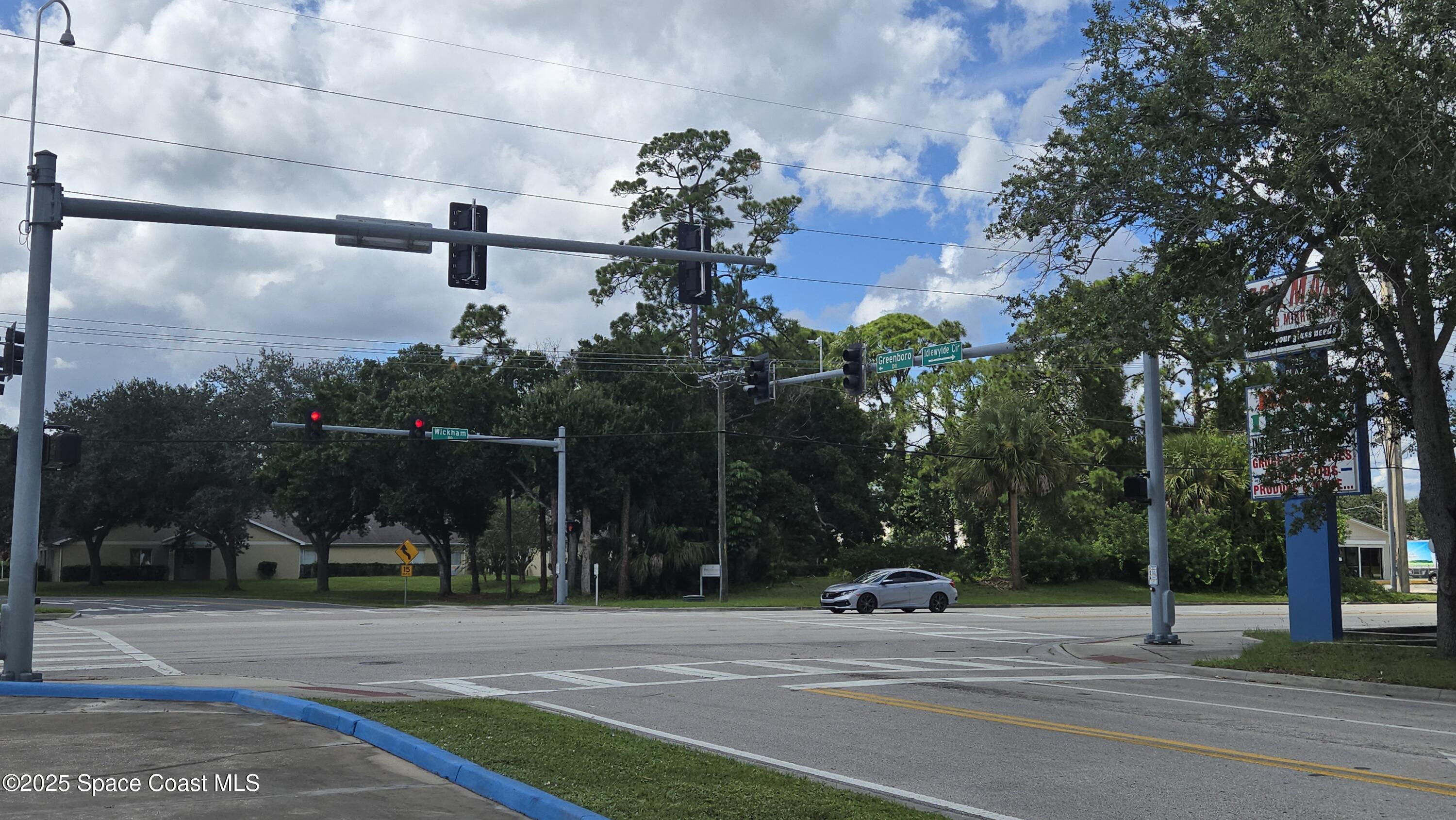 745 South Wickham Road West Melbourne, FL 32904 - Photo 39 of 67 a view of a fountain in front of a building