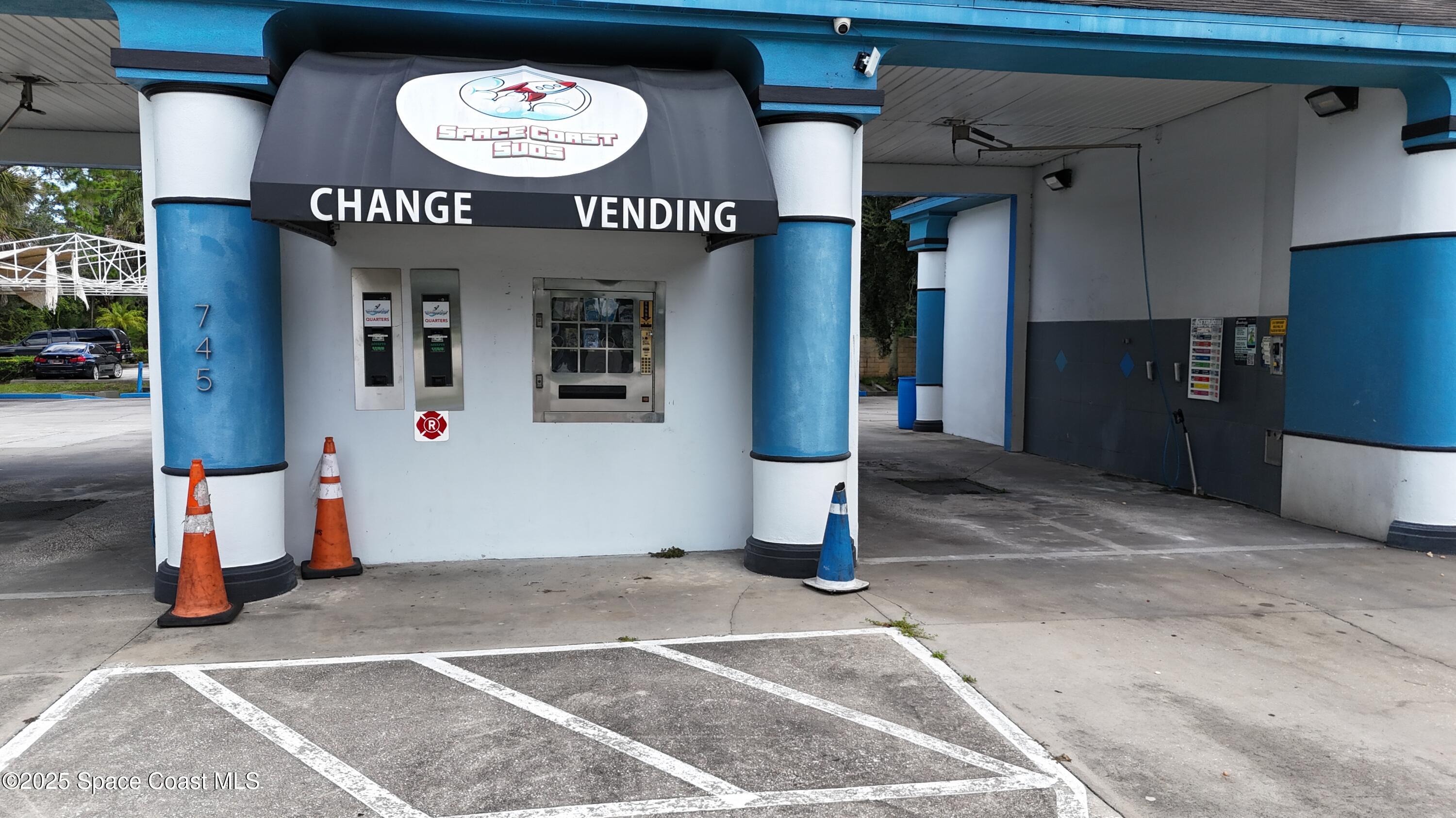 745 South Wickham Road West Melbourne, FL 32904 - Photo 47 of 67 a view of a refrigerator with storage