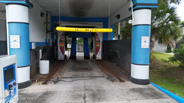 a view of a building with a yard