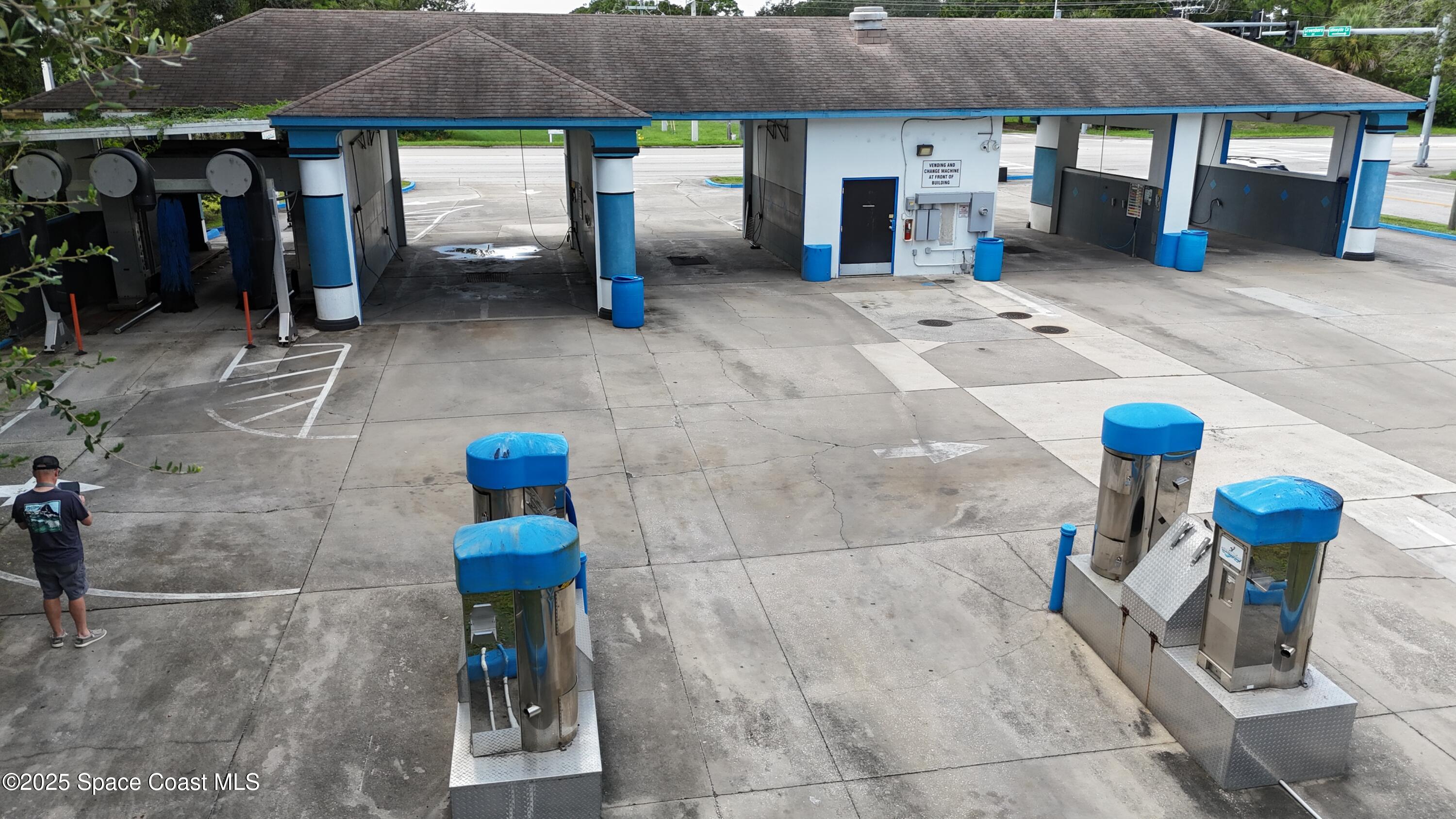 745 South Wickham Road West Melbourne, FL 32904 - Photo 5 of 67 a view of a chairs and table in backyard