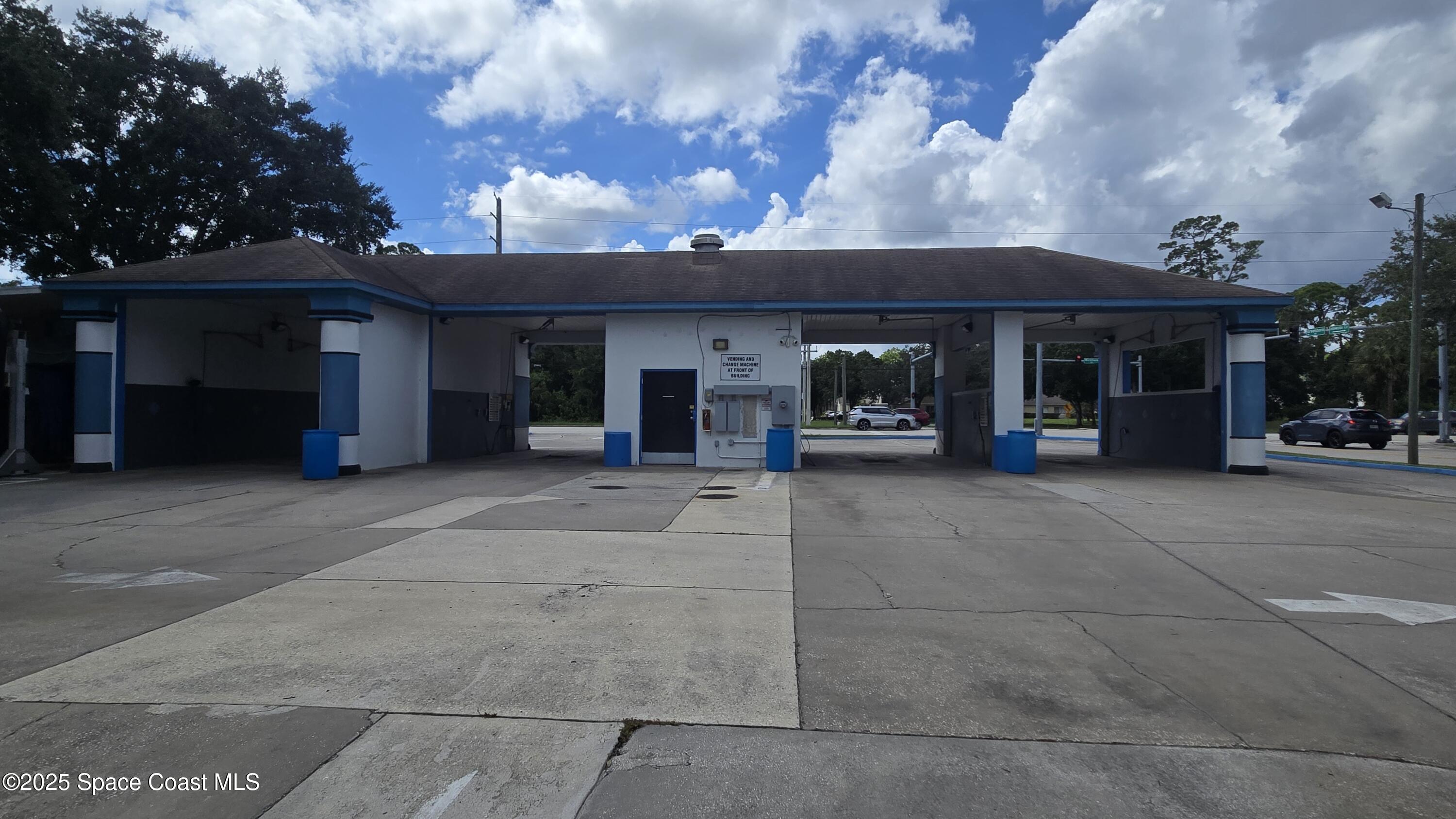 745 South Wickham Road West Melbourne, FL 32904 - Photo 8 of 67 a view of a house with a garage