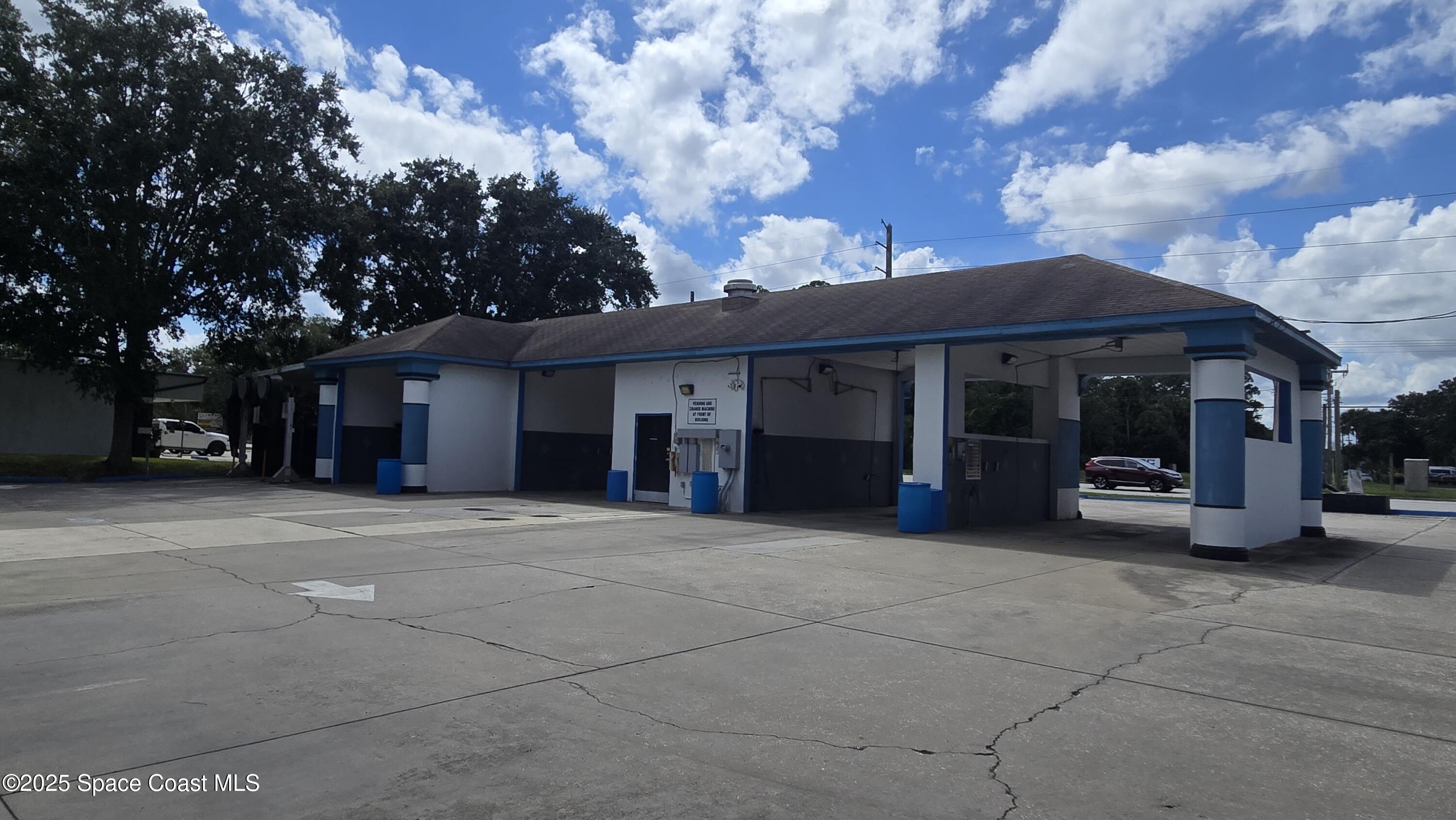 745 South Wickham Road West Melbourne, FL 32904 - Photo 9 of 67 a view of a house with a porch