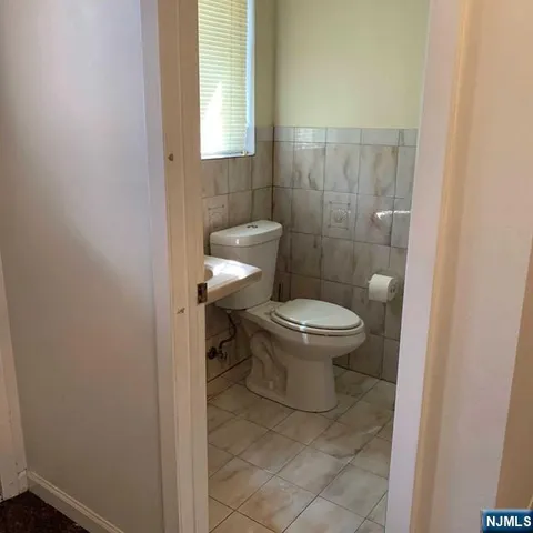 a bathroom with a toilet
