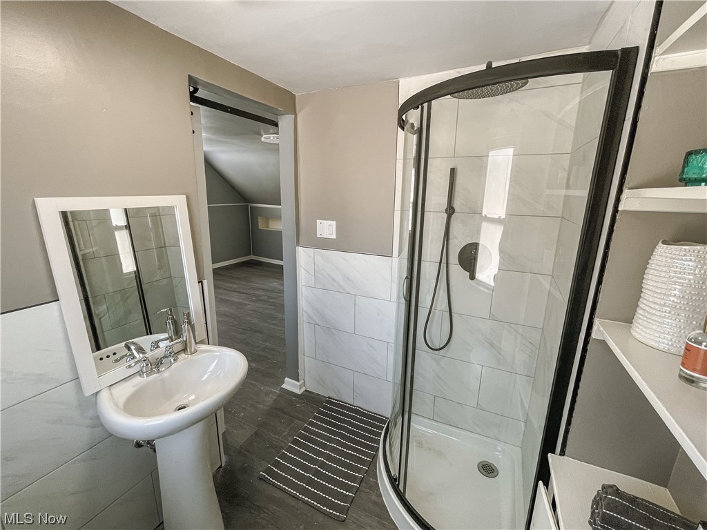 24709 Emery Road Warrensville Heights, OH 44128 - Photo 18 of 34 Bathroom featuring a shower with shower door and tile flooring