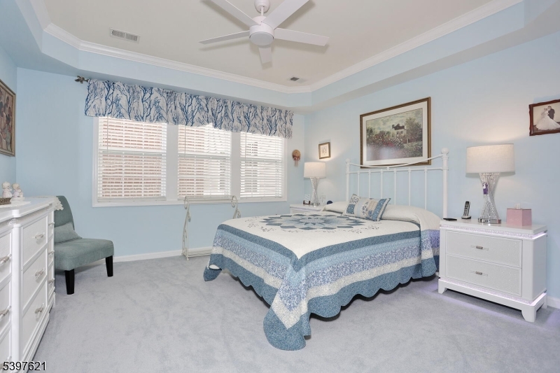3214 Warren's Way Wanaque, NJ 07465 - Photo 19 of 42 a spacious bedroom with a bed and a window