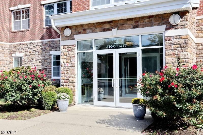 3214 Warren's Way Wanaque, NJ 07465 - Photo 2 of 42 a front view of a building with potted plants