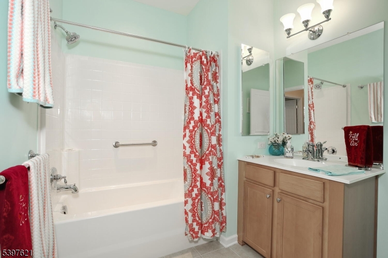 3214 Warren's Way Wanaque, NJ 07465 - Photo 25 of 42 a bathroom with a double vanity sink mirror and shower
