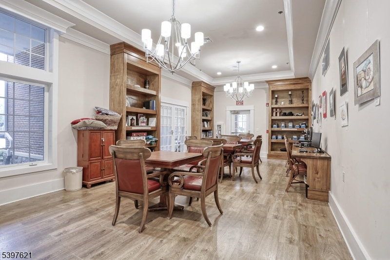 3214 Warren's Way Wanaque, NJ 07465 - Photo 34 of 42 a view of a dining room with furniture and chandelier