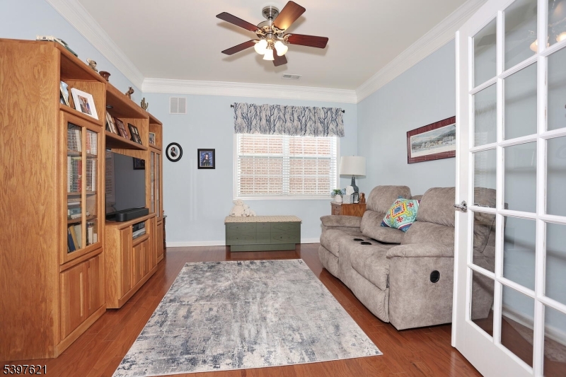 3214 Warren's Way Wanaque, NJ 07465 - Photo 8 of 42 a living room with stainless steel appliances granite countertop furniture a fireplace and a window
