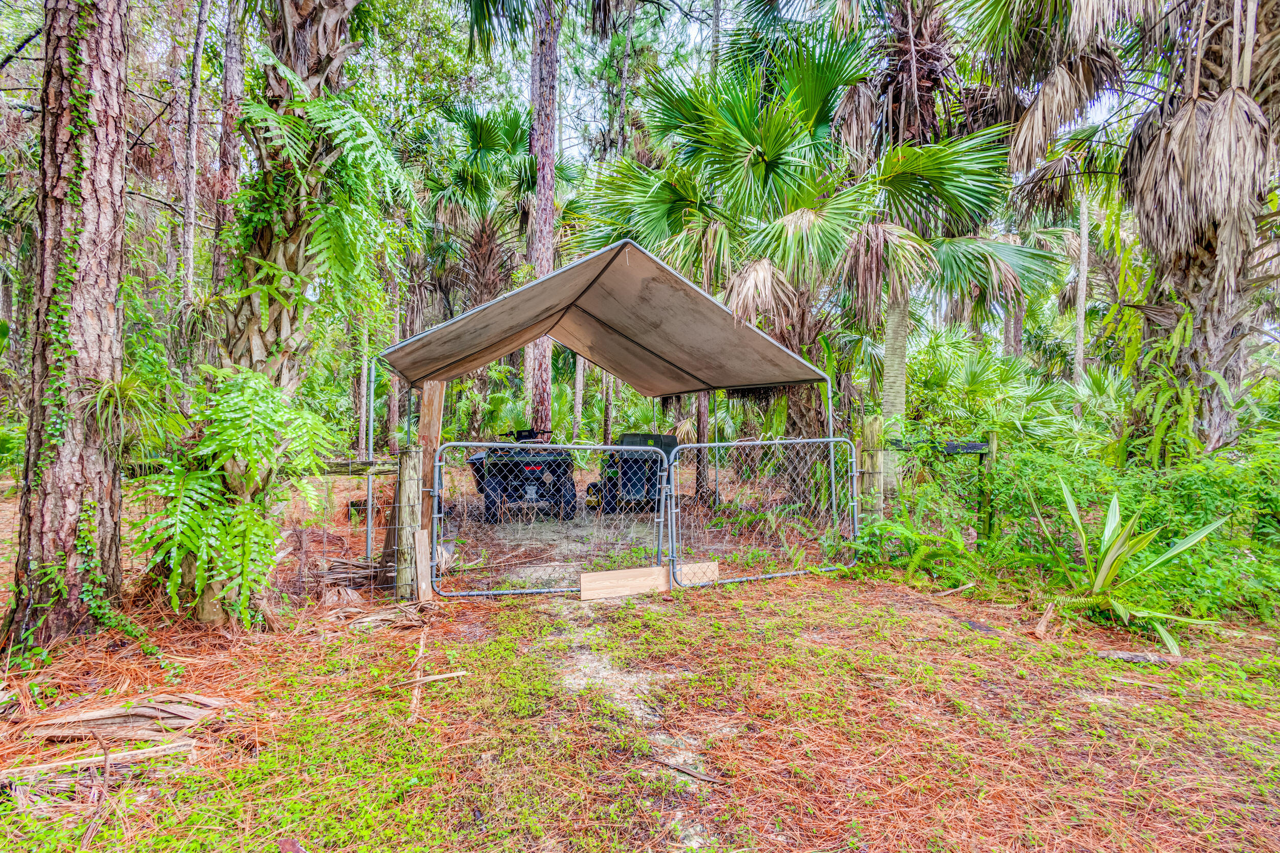 13578 Edith Road Loxahatchee Groves, FL 33470 - Photo 49 of 69 30c Ext RV Area Carport