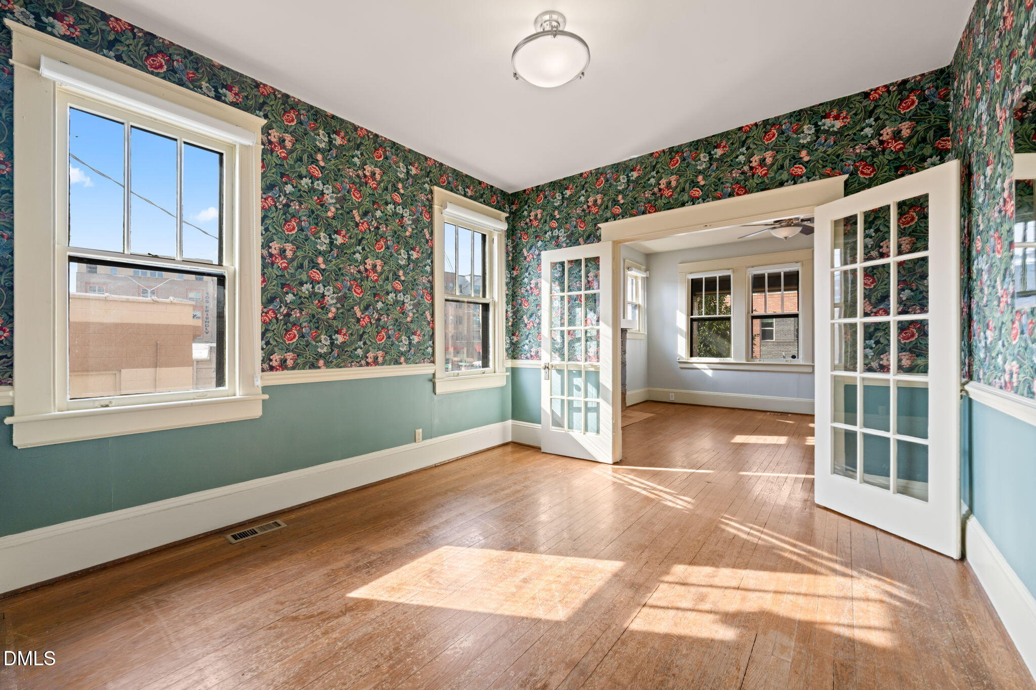 4 Dixie Trail Raleigh, NC 27607 - Photo 13 of 23 a view of an empty room with a window