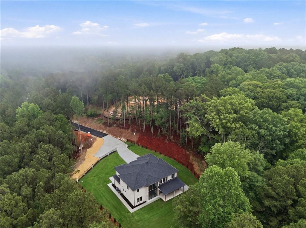 1563 Whitley Road Dacula, GA 30019 - Photo 44 of 44 an aerial view of a house with yard swimming pool and outdoor seating