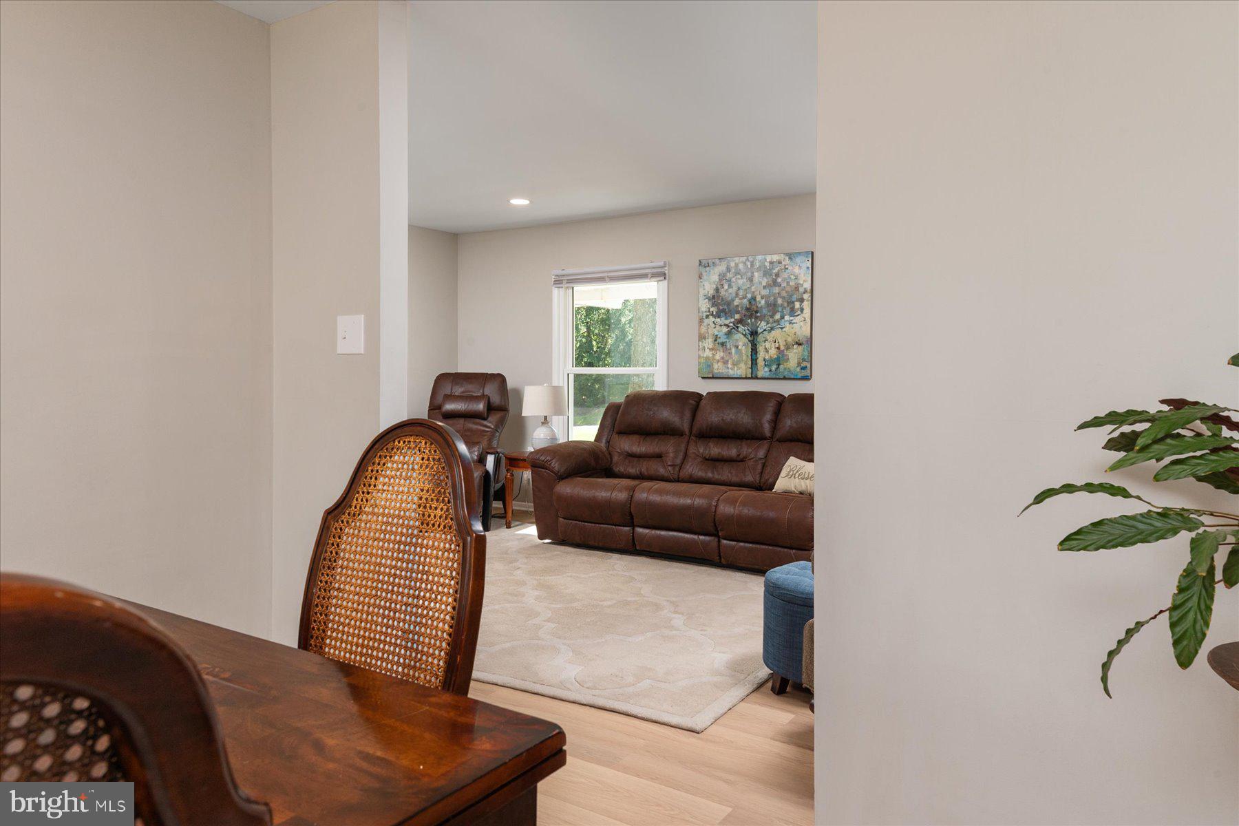 86 Milburn Circle Pasadena, MD 21122 - Photo 12 of 60 a living room with furniture and a window