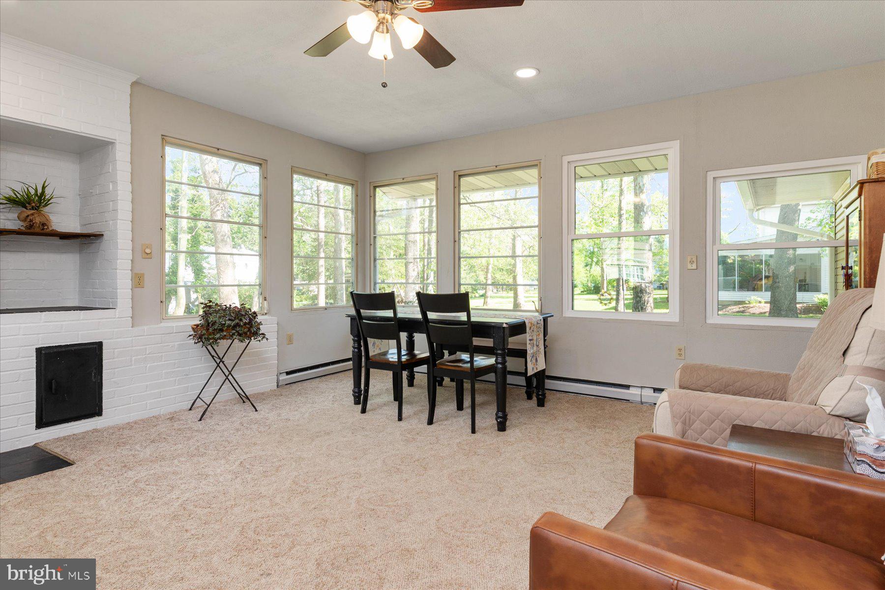 86 Milburn Circle Pasadena, MD 21122 - Photo 19 of 60 a living room with furniture and a fireplace