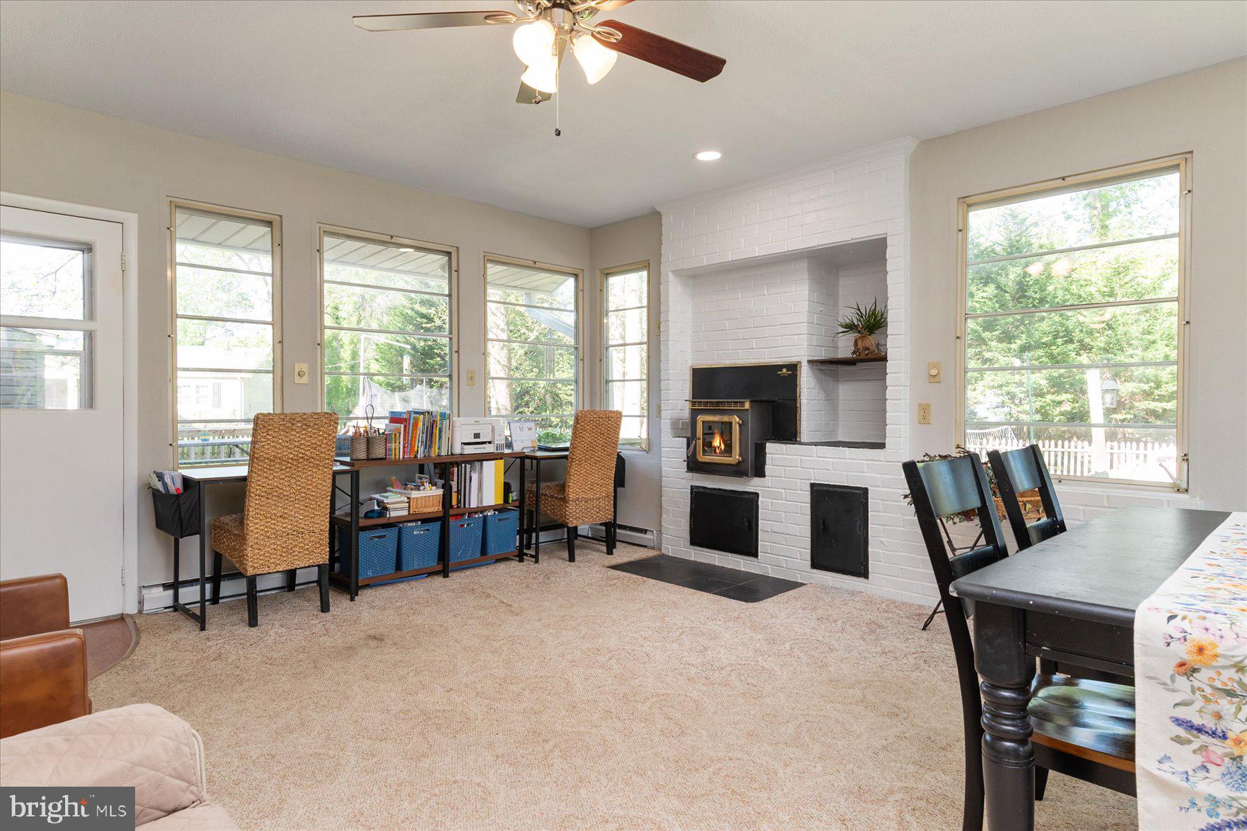 86 Milburn Circle Pasadena, MD 21122 - Photo 20 of 60 a view of a dining room with furniture window and outside view