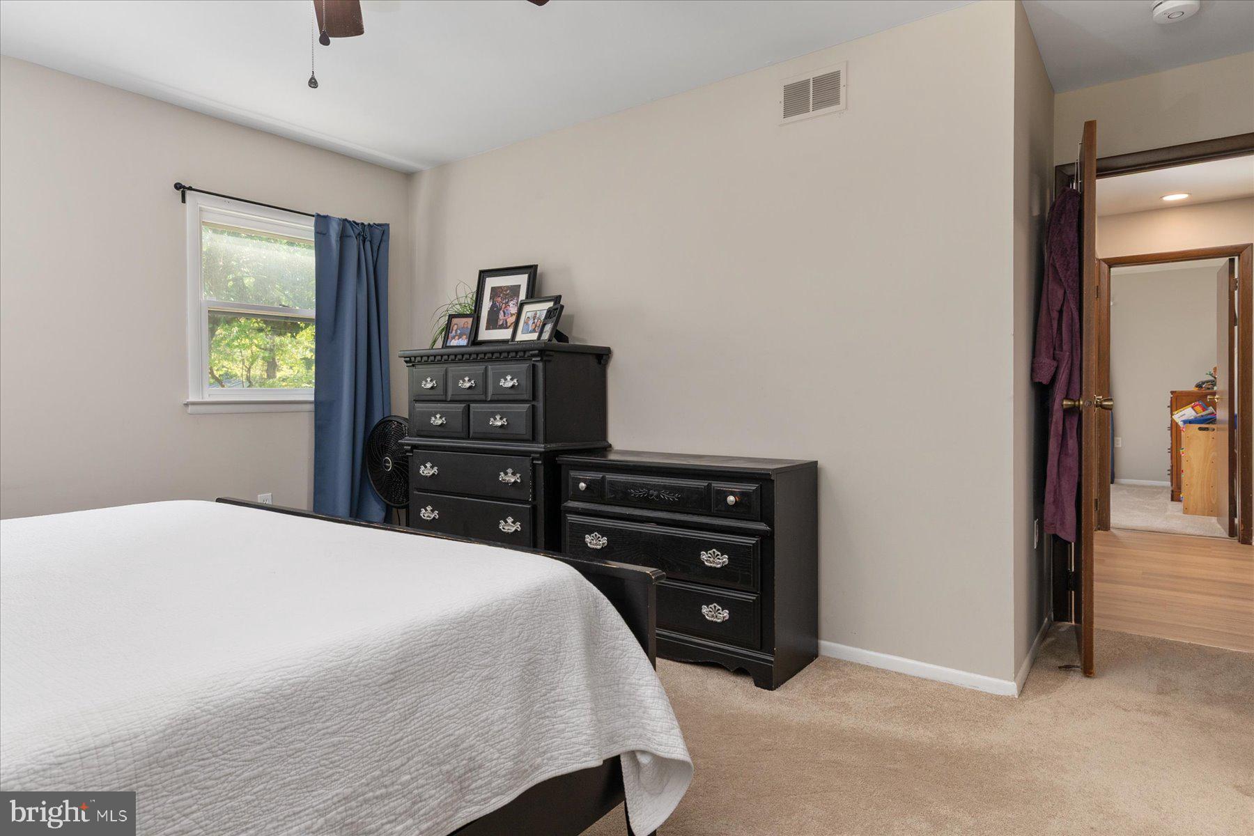 86 Milburn Circle Pasadena, MD 21122 - Photo 28 of 60 a bedroom with a bed and a closet