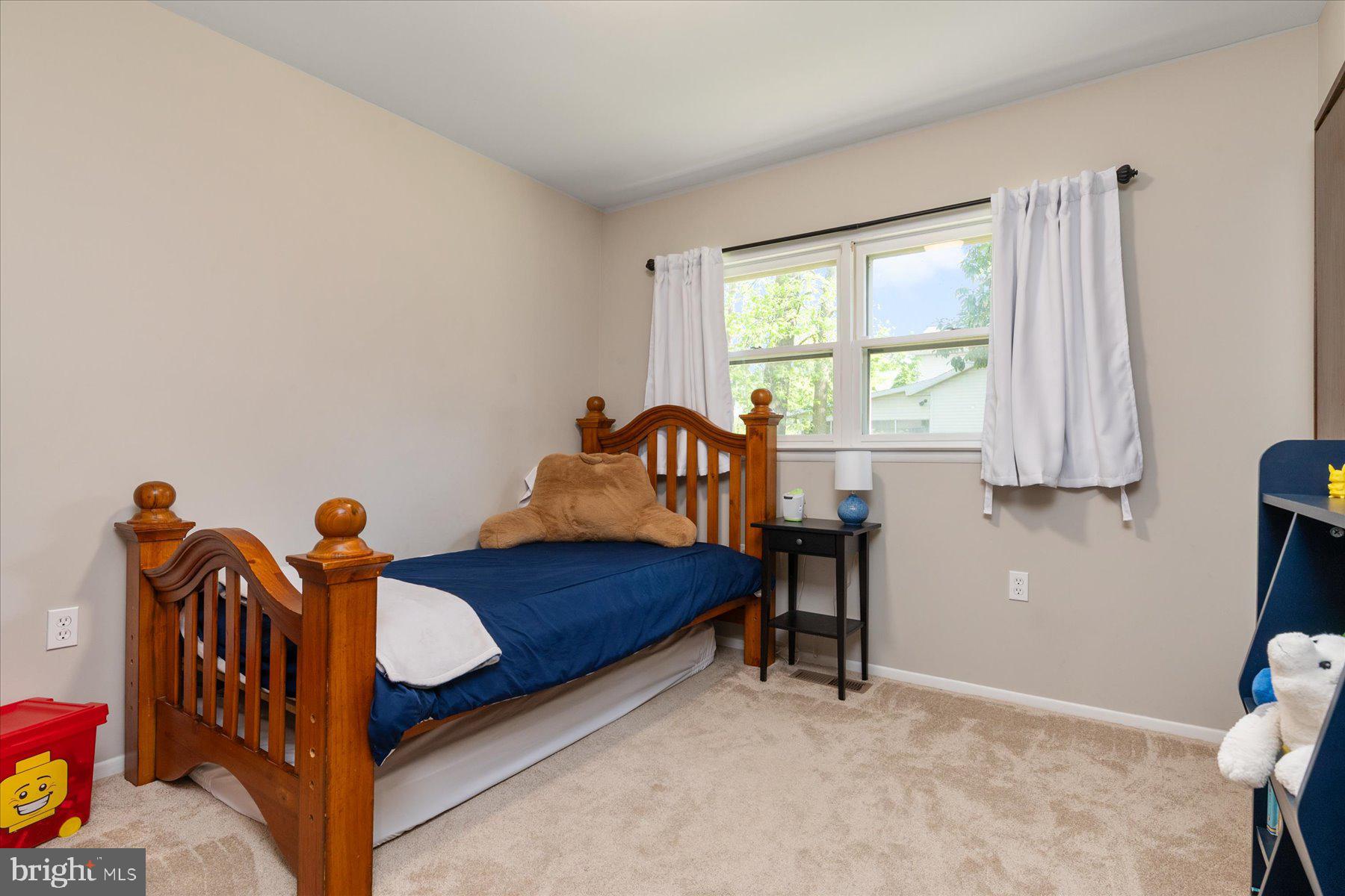 86 Milburn Circle Pasadena, MD 21122 - Photo 30 of 60 a bedroom with furniture and a window