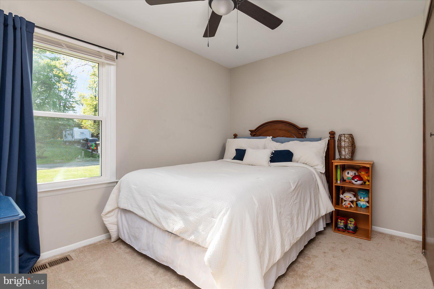 86 Milburn Circle Pasadena, MD 21122 - Photo 35 of 60 a bedroom with a bed and window