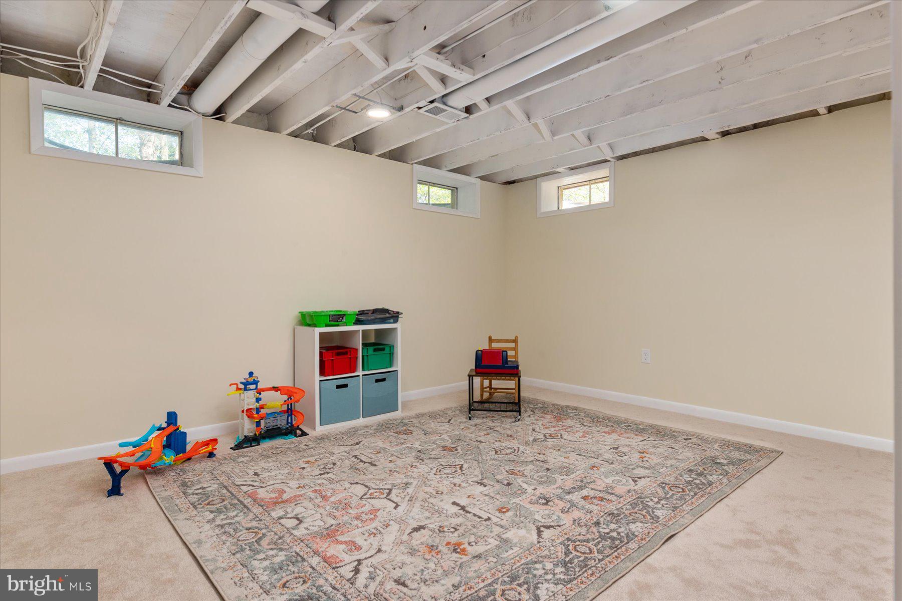 86 Milburn Circle Pasadena, MD 21122 - Photo 37 of 60 a view of a garage with toys