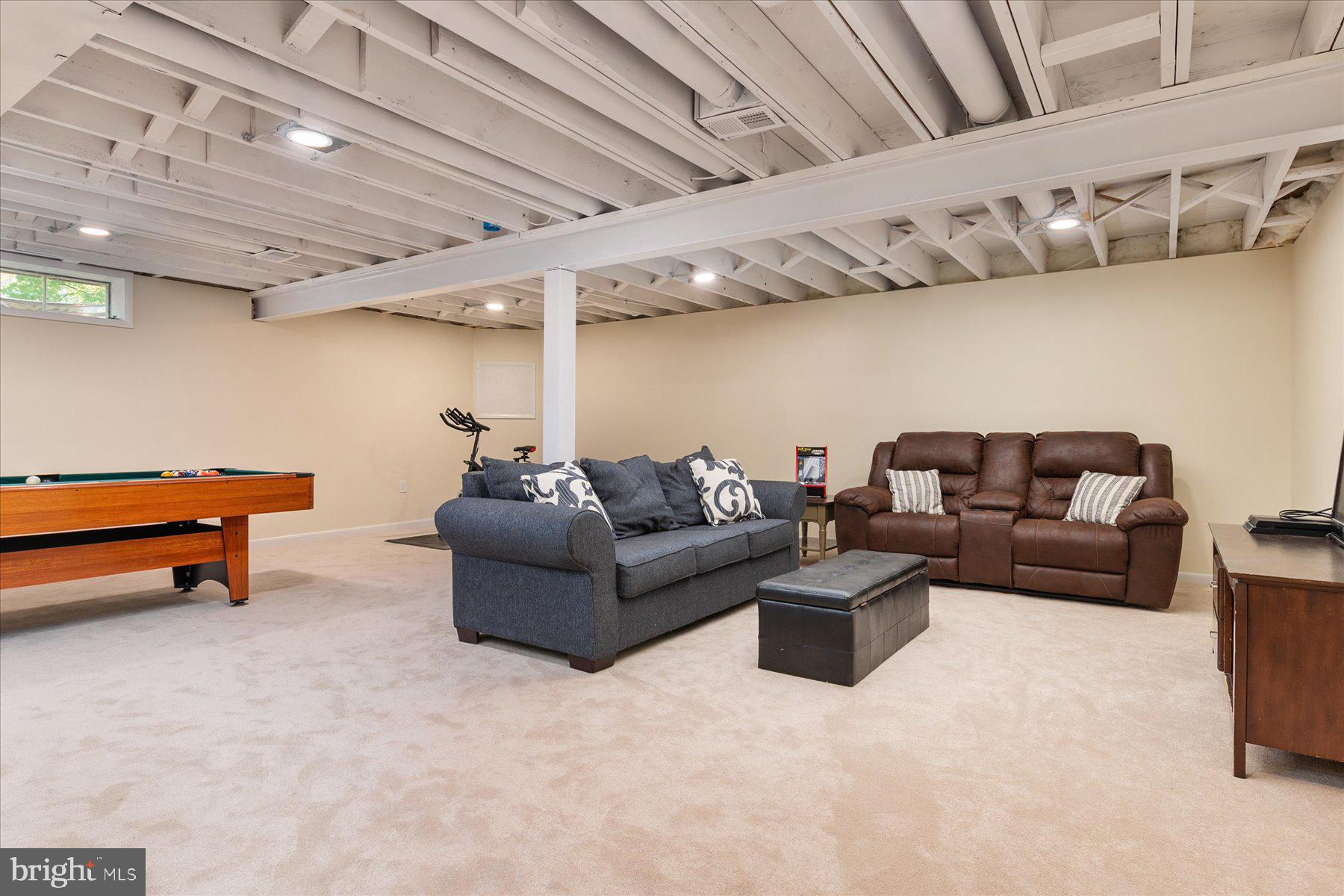 86 Milburn Circle Pasadena, MD 21122 - Photo 42 of 60 a living room with furniture and wooden floor