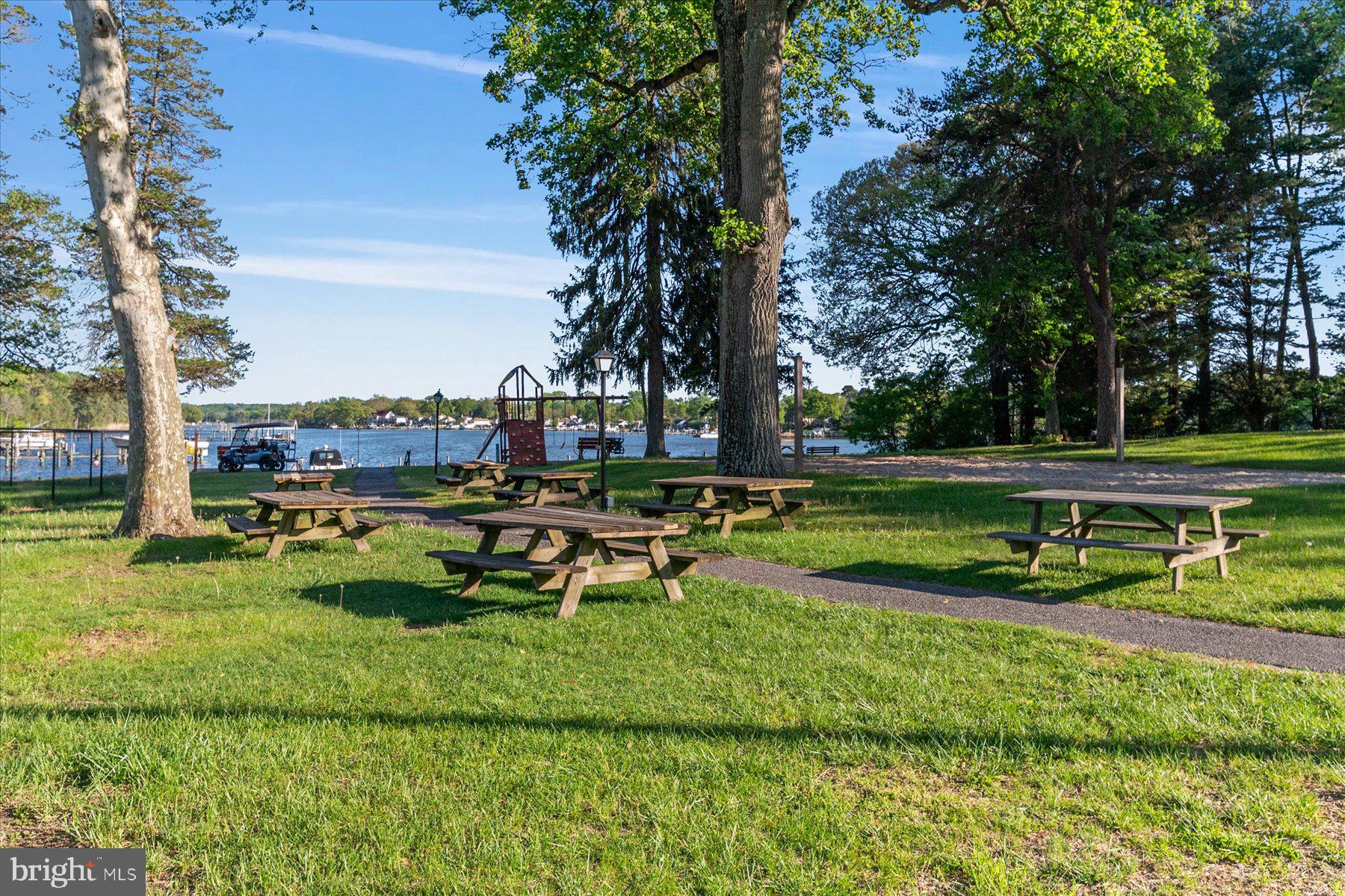 86 Milburn Circle Pasadena, MD 21122 - Photo 55 of 60 a view of a park with large trees