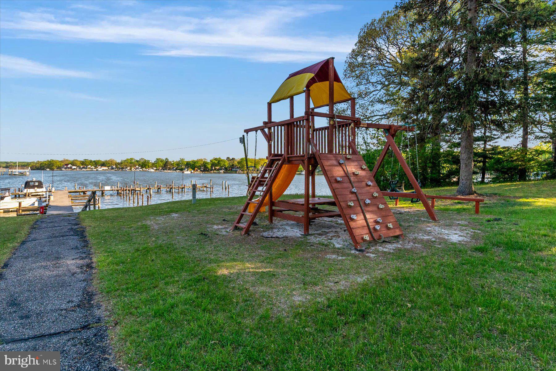 86 Milburn Circle Pasadena, MD 21122 - Photo 57 of 60 a view of a park with slide