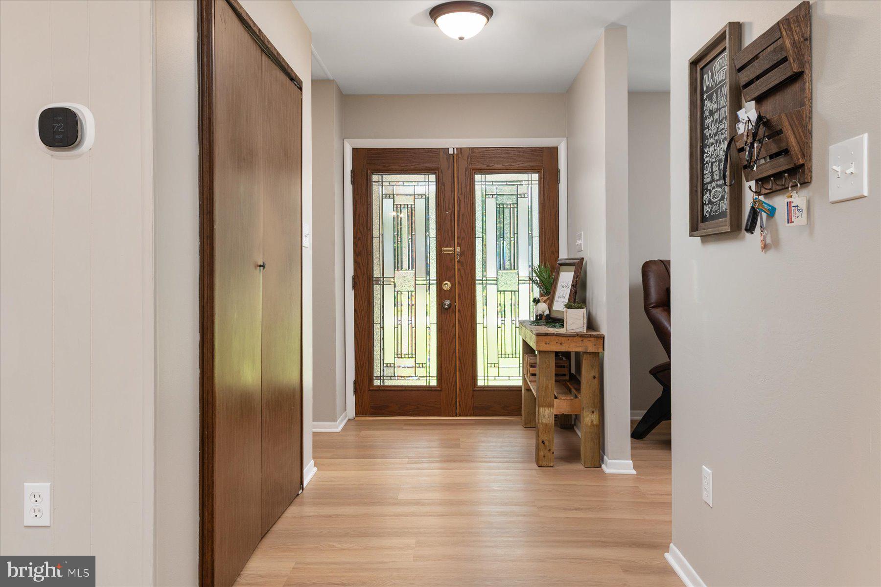 86 Milburn Circle Pasadena, MD 21122 - Photo 6 of 60 a view of a livingroom with a fireplace and furniture