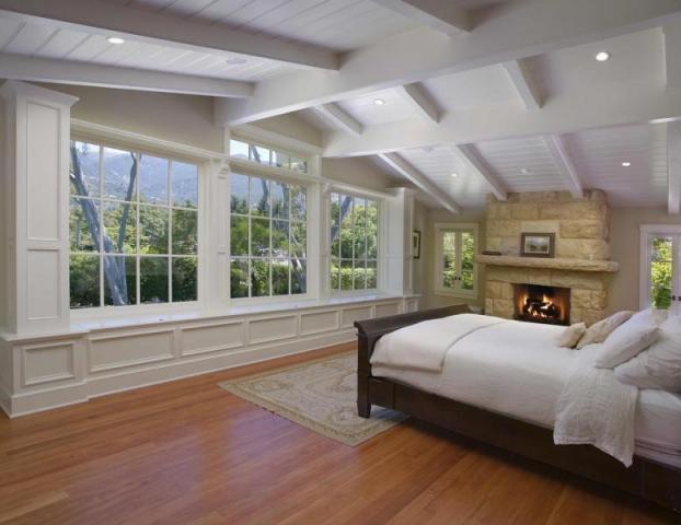 461 Live Oaks Road Montecito, CA 93108 - Photo 2 of 3 a bedroom with a large bed and a large window