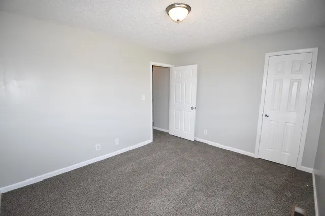 a view of balcony with wooden floor