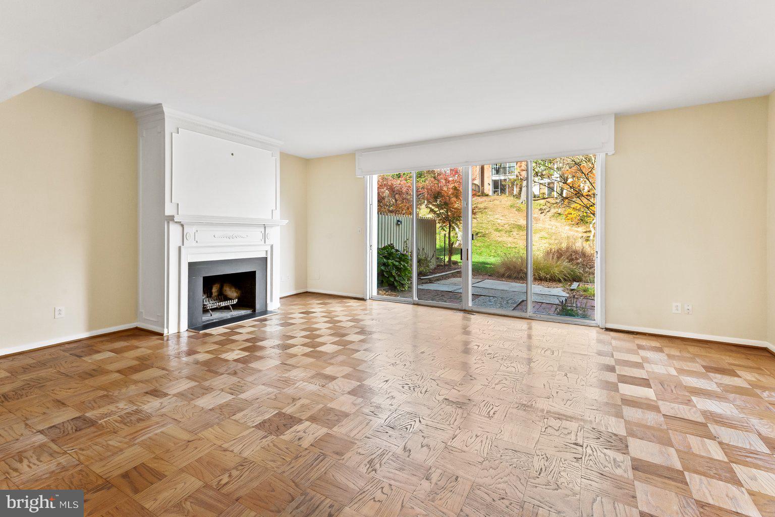 2 Hamlet Hill Road Baltimore, MD 21210 - Photo 14 of 32 floor to ceiling glass doors - wood burning fpl