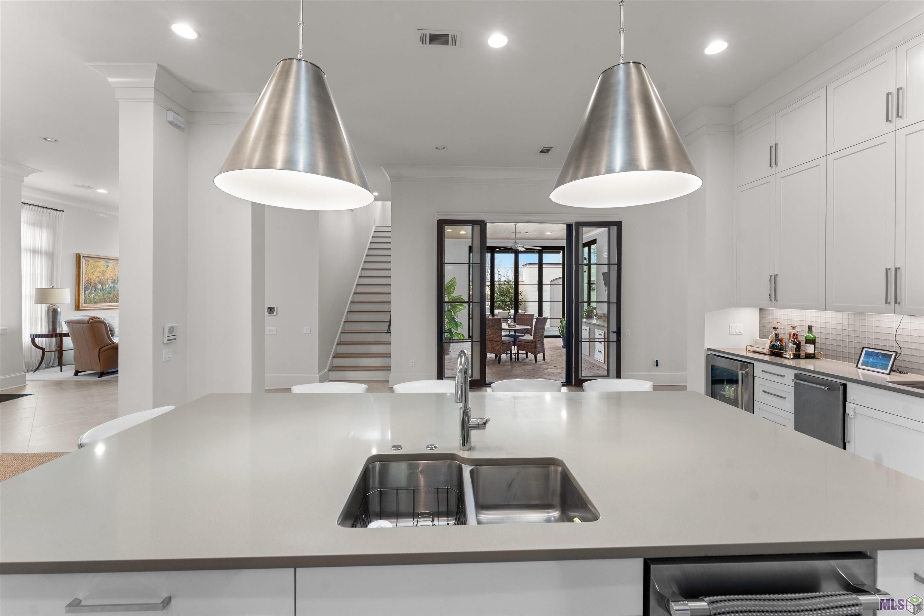 7313 Willow Grove Boulevard Baton Rouge, LA 70810 - Photo 13 of 56 Kitchen into Breakfast Area/Solarium