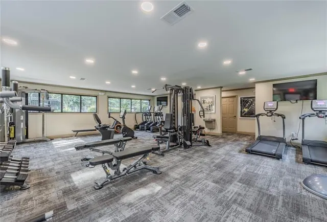 a view of a park with large trees