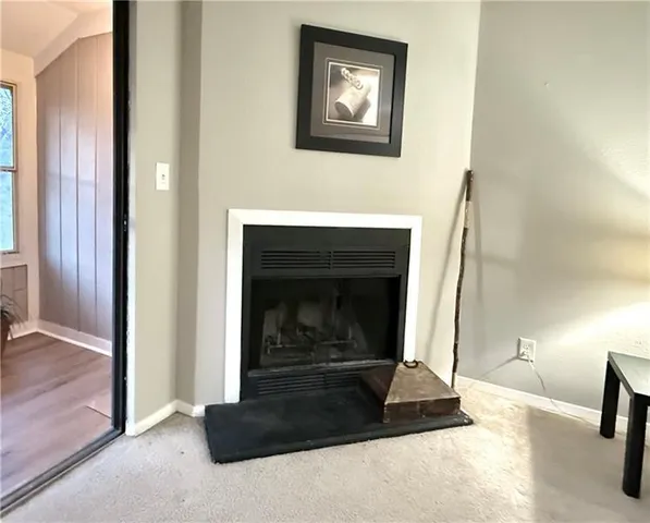 a living room with a fireplace